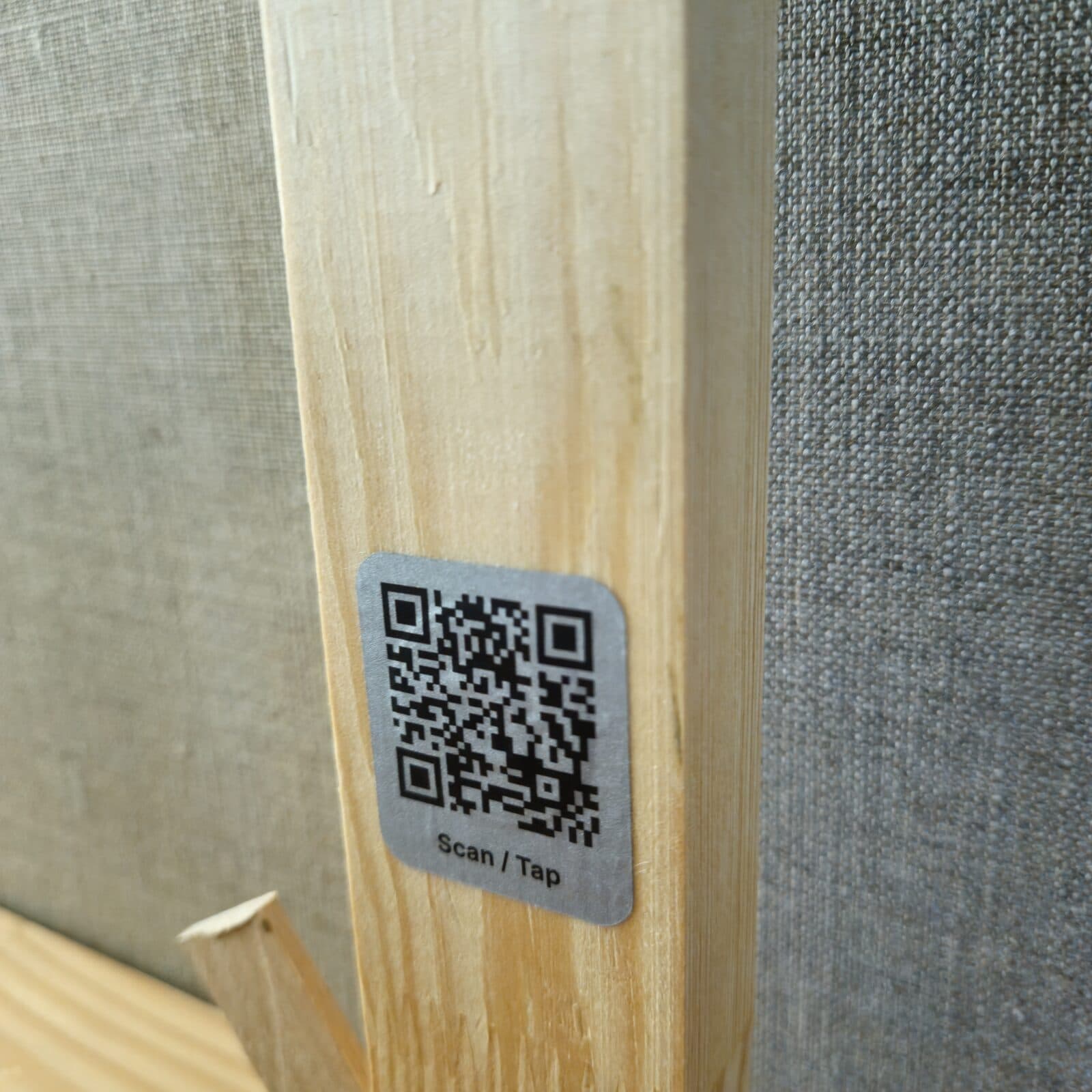 A Story Tag attached to the back or edge of an artwork.